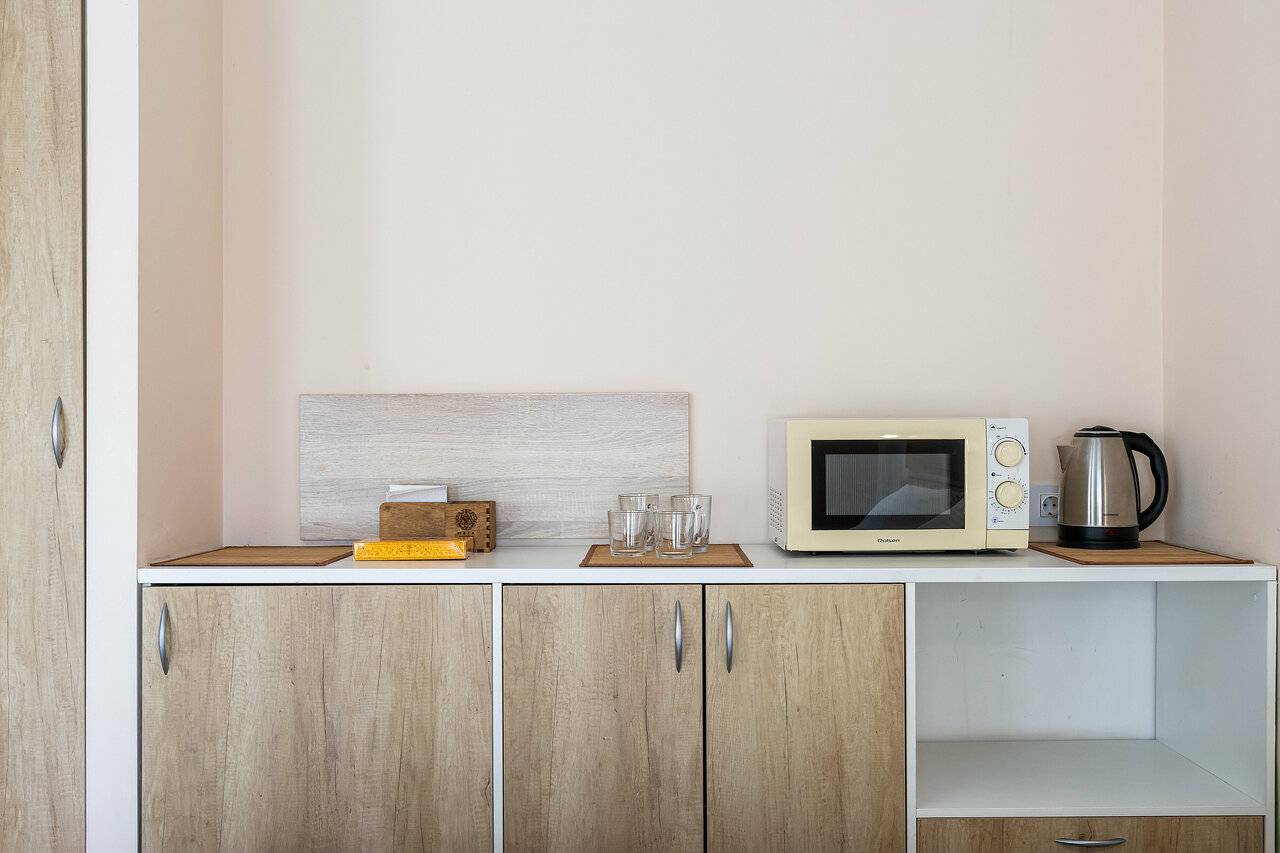 Фотографии номера Эконом с двуспальной кроватью с ванной комнатой на этаже в Гостинице Багет Нижний Новгород