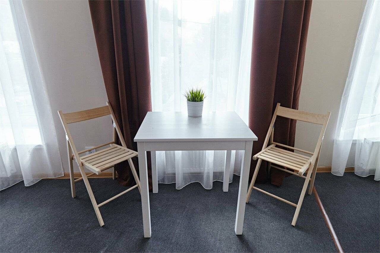 Фотографии номера Эконом с двуспальной кроватью с ванной комнатой на этаже в Гостинице Багет Нижний Новгород