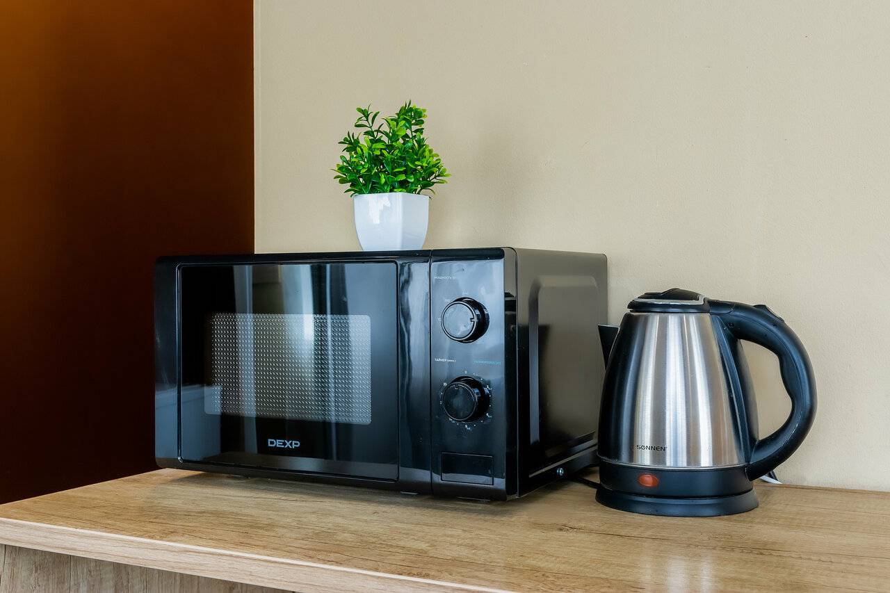 Фотографии номера Эконом с двуспальной кроватью с ванной комнатой на этаже в Гостинице Багет Нижний Новгород