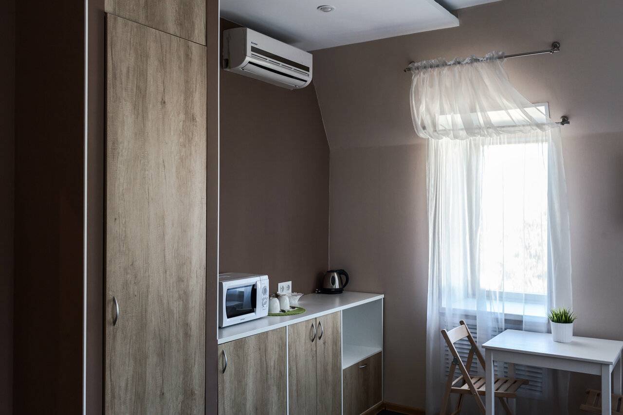 Фотографии номера Эконом с двуспальной кроватью с ванной комнатой на этаже в Гостинице Багет Нижний Новгород