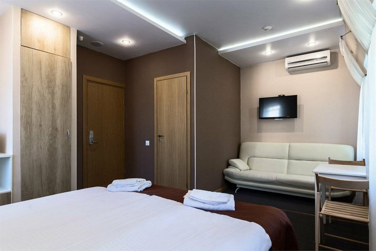 Фотографии номера Эконом с двуспальной кроватью с ванной комнатой на этаже в Гостинице Багет Нижний Новгород