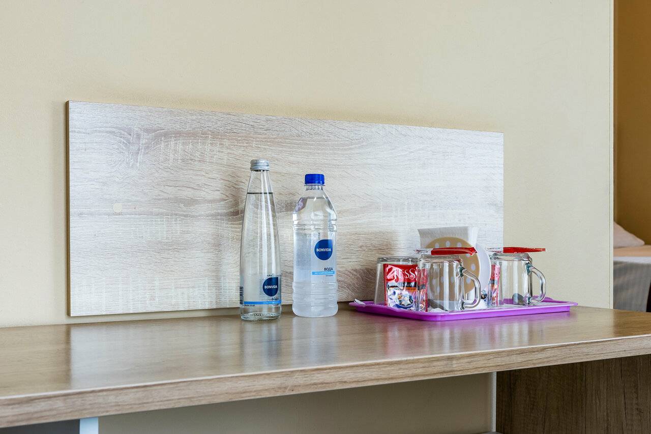 Фотографии номера Эконом с двуспальной кроватью с ванной комнатой на этаже в Гостинице Багет Нижний Новгород