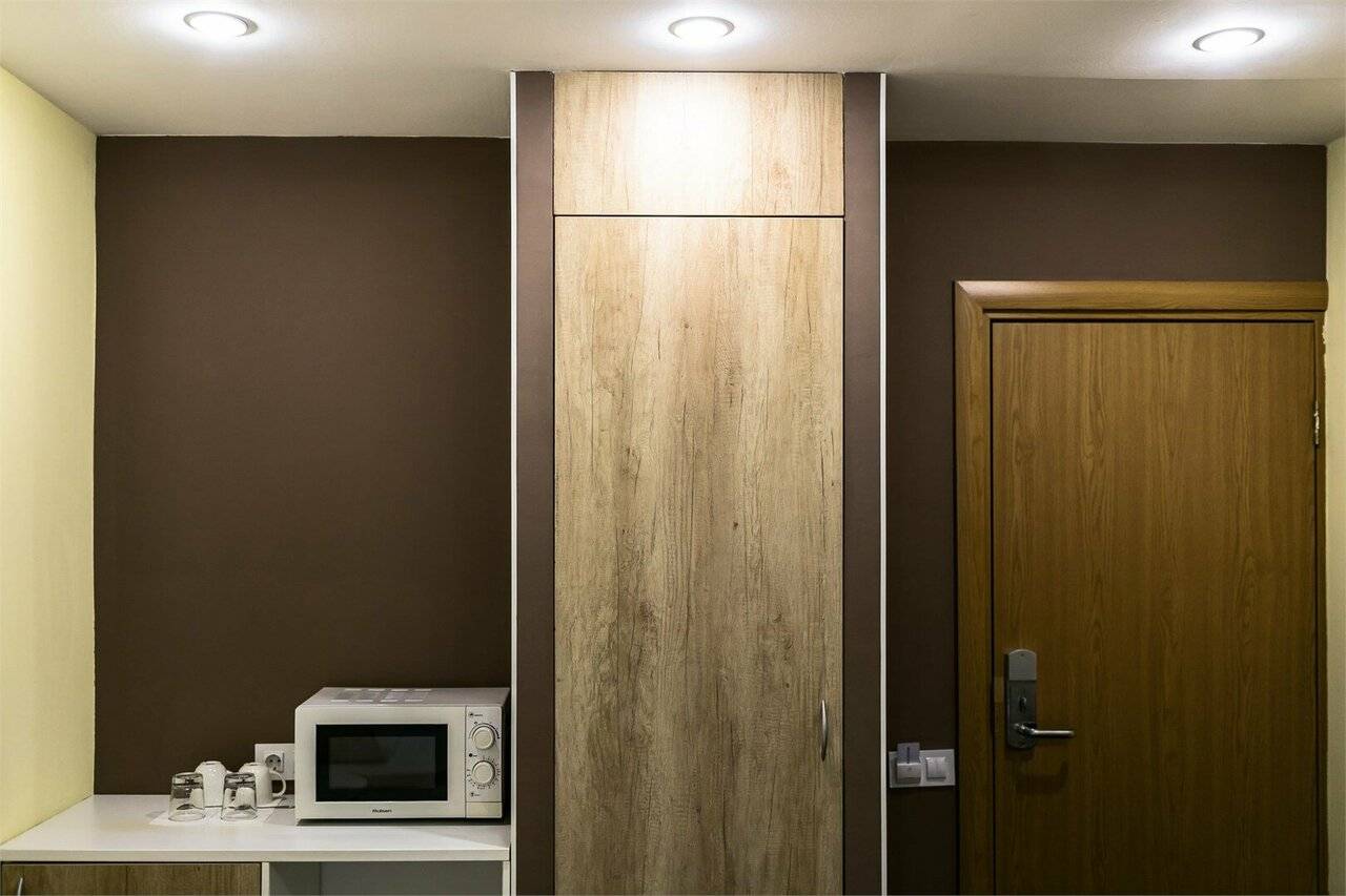 Фотографии номера Эконом с двуспальной кроватью с ванной комнатой на этаже в Гостинице Багет Нижний Новгород